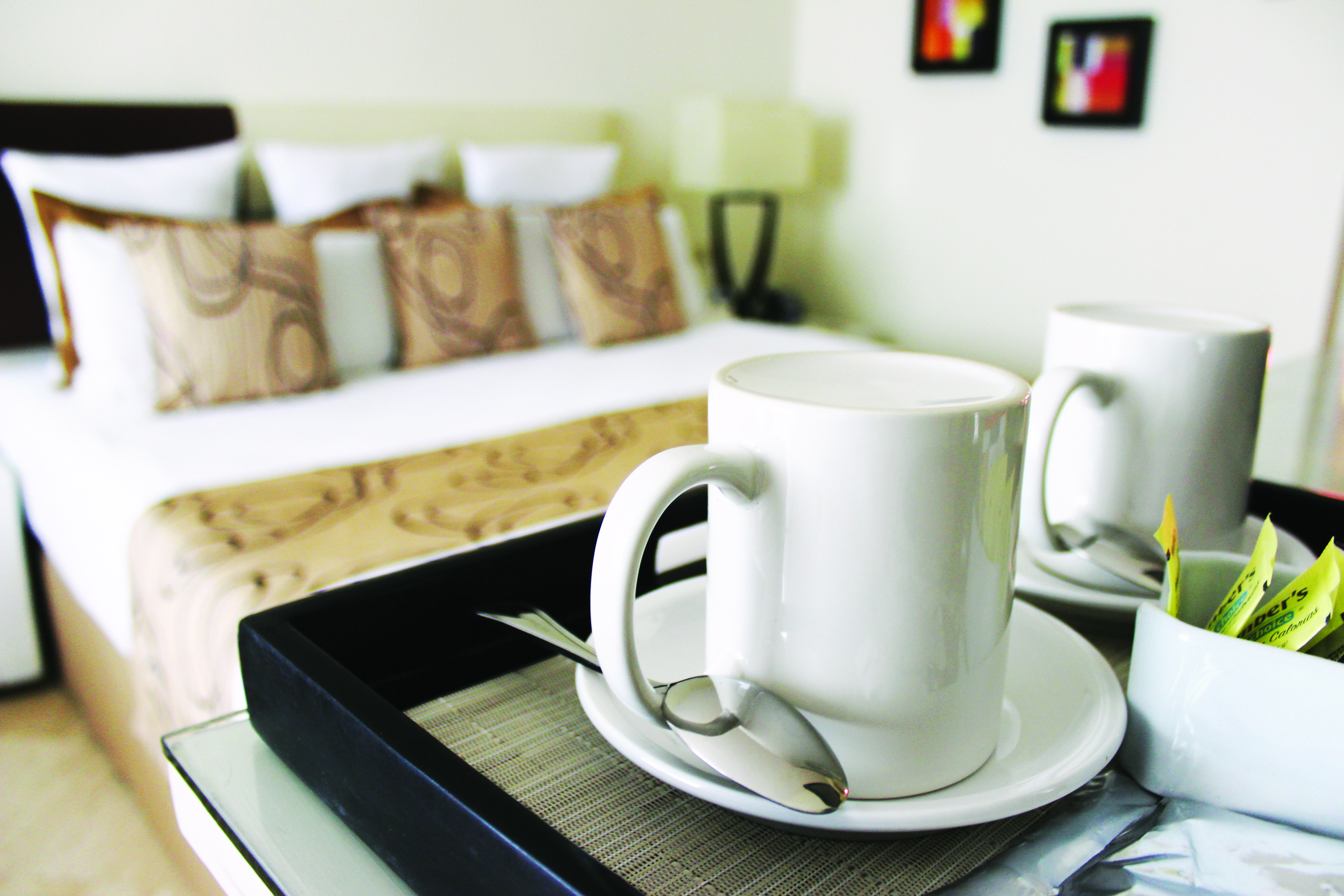 The Pyramid Cancun By Oasis Buitenkant foto A cup of coffee